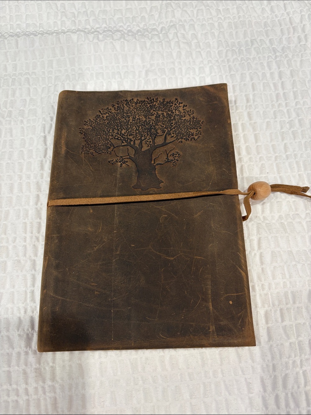 Olive Tree Unlined Leather Journal with Tree Embossing in Distressed Brown
